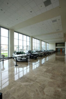 auto dealer flooring with beige tiles