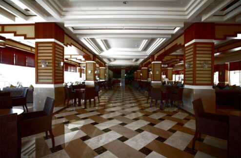 white, gold and beige flooring in dining area