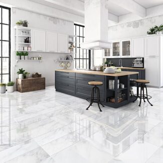 kitchen area with white tile flooring and black kitchen island