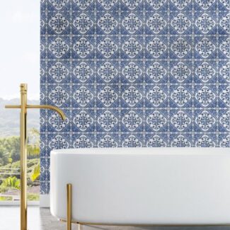 Marblesys blue florentine style tile on bathroom wall behind white tub