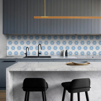 kitchen backsplash with white and blue floral design tiles