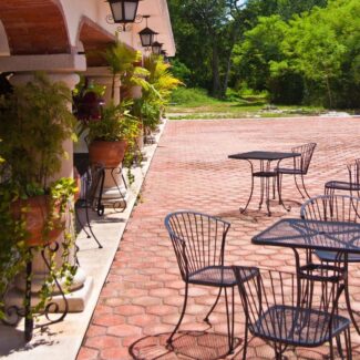 backyard patio tile with chairs and tables