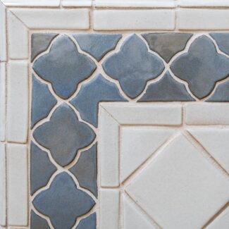 blue ceramic moroccan style tiles with white borders