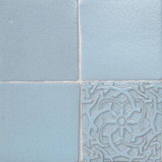 blue square ceramic tile with floral designs