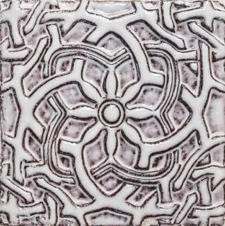 white ceramic tile with black intertwined designs