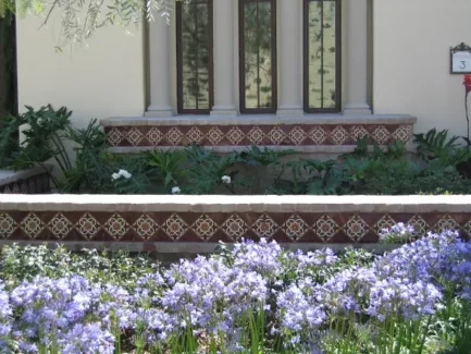 colorful patterned tile in backyard garden