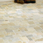 stone tiled flooring with boots