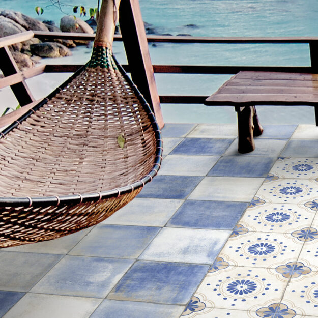 caribbean pool with beach and hammock with tile deck