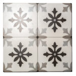 white tile with black floral design