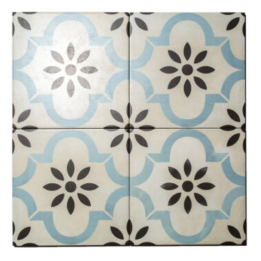 white tile with blue border design around black floral pattern