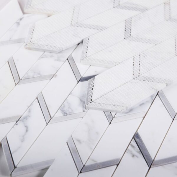 black and white marble mosaic tiles in pointed arrow designs