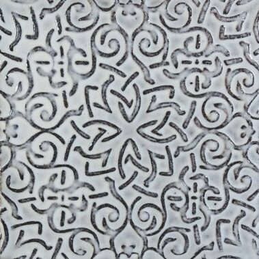 white ceramic tiles with black line drawing designs