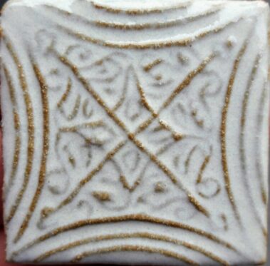 white ceramic tile with X line designs