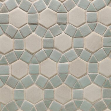 patterned tile with green circles surrounding white hexagons