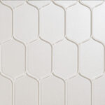 white glass tile in rounded hexagonal designs