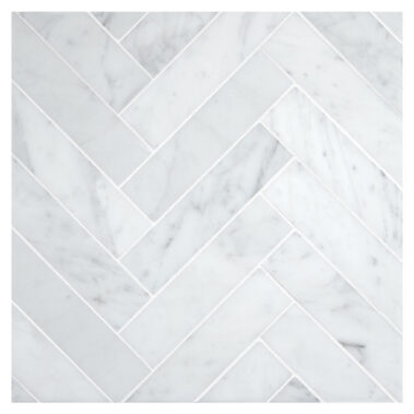 white and gray marble tiles in zigzag mosaic pattern